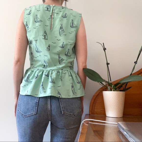 Yumi Peplum Sleeveless Blouse - Picture 2 of 5